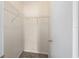 Walk-in closet with shelving units provides plenty of space for clothing and storage at 22 Banyan Dr, Ocala, FL 34472