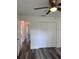 Bedroom featuring a closet, laminate flooring and doorway to hallway at 3 Dogwood Drive Loop, Ocala, FL 34472