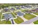 Community aerial shot highlighting homes with well-kept lawns and fenced yards at 5537 Se 91St Pl, Ocala, FL 34480