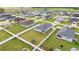 Aerial view of a home showcasing a large, fenced backyard in a peaceful community setting at 5537 Se 91St Pl, Ocala, FL 34480