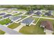 Birds eye view showcasing home's lawn and the neighborhood at 5537 Se 91St Pl, Ocala, FL 34480