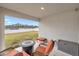 Comfortable patio space, perfect for entertaining, features neutral tones and plenty of room to relax at 5537 Se 91St Pl, Ocala, FL 34480