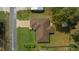 Aerial view of home with a large backyard and driveway, featuring a well-maintained lawn and a spacious layout at 6718 Cherry Rd, Ocala, FL 34472