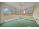 View of screened in back porch with ceiling fan at 6718 Cherry Rd, Ocala, FL 34472