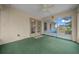 View of screened in back porch with access to the backyard patio at 6718 Cherry Rd, Ocala, FL 34472