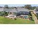 This home has a screened-in pool, an outdoor patio area, and a well manicured lawn at 6865 Sw 97Th Terrace Rd, Ocala, FL 34481
