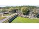 A scenic view of the community, featuring a picturesque bridge, water features, and lush landscaping at 6865 Sw 97Th Terrace Rd, Ocala, FL 34481