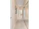 Neutral-toned hallway with carpet and a large sliding mirror door at 6865 Sw 97Th Terrace Rd, Ocala, FL 34481