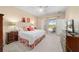 A view of the main bedroom with access to the patio at 6865 Sw 97Th Terrace Rd, Ocala, FL 34481