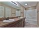 Bathroom with double sink vanity and a shower/tub combination at 7082 Sw 131St Loop, Ocala, FL 34473
