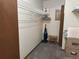 Walk-in closet providing ample storage space with shelving and carpet flooring at 9140 Sw 103Rd Ln, Ocala, FL 34481