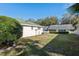 Exterior of the home showcasing the backyard and patio at 9581 Sw 85Th Ave # D, Ocala, FL 34481