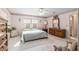 Calm bedroom with dresser, mirror and lots of sunlight at 9581 Sw 85Th Ave # D, Ocala, FL 34481