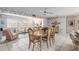 Charming dining area adjacent to the living room with a table for six, perfect for Gathering gatherings at 9581 Sw 85Th Ave # D, Ocala, FL 34481