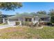 Charming single-story home with a two-car garage, and well-maintained front yard at 9581 Sw 85Th Ave # D, Ocala, FL 34481