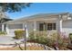 Charming single-story home with well-maintained front yard and covered entry at 9581 Sw 85Th Ave # D, Ocala, FL 34481