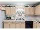 Bright kitchen featuring a double sink, stainless steel appliances, and plenty of cabinet space at 9581 Sw 85Th Ave # D, Ocala, FL 34481