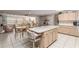 Bright kitchen area that connects to the dining and living spaces, creating a warm, inviting flow at 9581 Sw 85Th Ave # D, Ocala, FL 34481