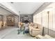 Open-concept living room and dining area with coordinated decor and plenty of space at 9581 Sw 85Th Ave # D, Ocala, FL 34481