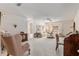 Bright living room with neutral tones, comfortable seating, and a ceiling fan for added comfort at 9581 Sw 85Th Ave # D, Ocala, FL 34481