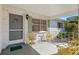 Cozy front porch with seating area, perfect for relaxing and enjoying the outdoors at 9581 Sw 85Th Ave # D, Ocala, FL 34481