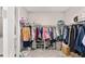 Spacious walk-in closet with ample shelving and hanging space for organization at 9974 Sw 88Th Loop, Ocala, FL 34481