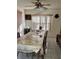 Traditional dining room featuring a large table with seating and tile floors at 10 Hickory Loop, Ocala, FL 34472