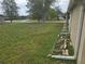 Expansive backyard featuring lush green lawn near the side of the home at 10040 Sw 98Th Ave, Ocala, FL 34481