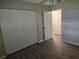 Spacious bedroom featuring a large closet, neutral tones, and modern flooring at 10040 Sw 98Th Ave, Ocala, FL 34481