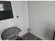 Space showing the laundry hookups, chair, and a window for light at 10040 Sw 98Th Ave, Ocala, FL 34481