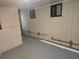Unfinished room showcasing plumbing access, ready for personalized updates at 10040 Sw 98Th Ave, Ocala, FL 34481