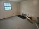 Empty room ready for customization, featuring a window for natural light at 10040 Sw 98Th Ave, Ocala, FL 34481