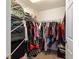 Walk-in closet featuring ample storage space and organized shelving and hanging racks at 10400 Sw 50Th Ct, Ocala, FL 34476