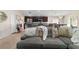 Open concept living room with modern kitchen and dining areas at 10400 Sw 50Th Ct, Ocala, FL 34476