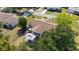 Aerial view of the house showing the patio with gazebo, roof and backyard at 11475 Sw 85Th Ave, Ocala, FL 34481