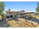 Backyard featuring a patio with gazebo, outdoor seating and grill with fenced perimeter at 11475 Sw 85Th Ave, Ocala, FL 34481