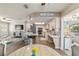 Bright kitchen with marble countertops, stainless steel appliances, and wood floors at 11475 Sw 85Th Ave, Ocala, FL 34481