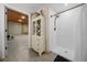This bathroom features a modern shower and stylish tile flooring, creating a clean and inviting space at 11707 Se 101St Court Rd, Belleview, FL 34420