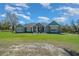 Charming home with great curb appeal, featuring a spacious front yard at 11707 Se 101St Court Rd, Belleview, FL 34420