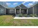 Beautiful home exterior with lush green grass and well-maintained landscaping at 11707 Se 101St Court Rd, Belleview, FL 34420