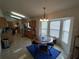 Cozy kitchen nook with tile floors, ample lighting, and a bay window at 14191 Sw 115Th Ter, Dunnellon, FL 34432