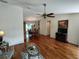 Spacious living and dining area featuring hardwood floors and natural light at 14191 Sw 115Th Ter, Dunnellon, FL 34432
