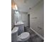 Bathroom with a toilet, double vanity, and towel rack on the wall at 15 Locust Trak, Ocala, FL 34472