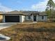 Charming single-story home with a two-car garage and inviting front entrance at 15 Locust Trak, Ocala, FL 34472