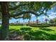 Community building with lush landscaping, mature trees, and a serene atmosphere at 15092 Sw 14Th Avenue Rd, Ocala, FL 34473