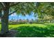 Community center framed by mature trees and well-maintained landscaping, promoting a welcoming and vibrant environment at 15092 Sw 14Th Avenue Rd, Ocala, FL 34473
