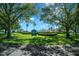Summerglen Community Center sign framed by lush greenery, inviting residents and visitors to explore the amenities at 15092 Sw 14Th Avenue Rd, Ocala, FL 34473