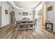 Bright dining room boasts a large window, chandelier, and seating for six, perfect for gatherings at 15092 Sw 14Th Avenue Rd, Ocala, FL 34473