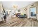 Comfortable living room area with laminate flooring and open layout at 15092 Sw 14Th Avenue Rd, Ocala, FL 34473