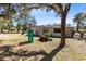 Well-maintained backyard featuring a lush lawn, mature trees, and space for outdoor activities at 1533 Pine St, Apopka, FL 32703